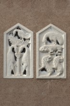Animal reliefs on a house wall, Venice, Veneto, Italy