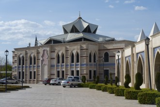 Building with traditional architecture and distinctive domed roof, Irfan Medeniyeti Arastirma ve