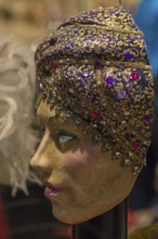 Venician mask in a shop window, Venice, Italy
