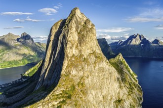 Aerial view of Mt. Segla, in the back Mt. Grytetippen (left) and Mt. Breidtinden, Senja Island,