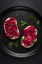 Sandwiches with gravlax salmon, cream cheese, capers, greens, breakfast, homemade