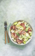 Caesar salad with fried bacon, quail eggs, homemade, no people