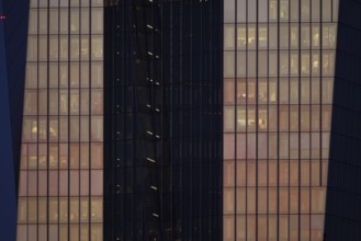 The setting sun shines on the glass façade of the European Central Bank (ECB) in Frankfurt am Main,