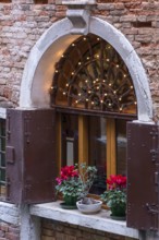 Decorative old window of a residential building, Venice, Veneto, Italy