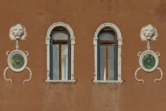 Lion heads at a palace, Venice, Veneto, Italy