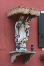 Saint figure under a canopy, Venice, Veneto, Italy