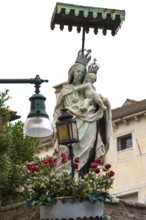 Sculpture of the Virgin and Child under a canopy, Venice, Veneto, Italy