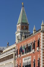 Tower of St. Mark's Campanile, in front the 5 star Hotel Danieli, blue sky, Venice, Veneto, Italy