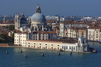Santa Maria della Salute church, Museum of Modern Art in front, cruise ships anchored at the back,