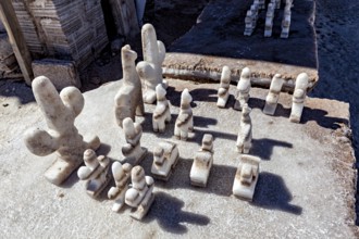 Salt chess pieces on a board in a detailed, bright desert setting, salt sculptures in the Salar de