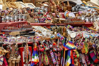 Colourful traditional crafts and souvenirs on a market stand, tourist and souvenir market of Santa