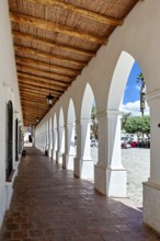 Colonial arcade series with wooden roof, opens to a public square, The arcades of Cachi in