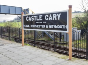 Railway station platform sign Castle Cary junction for Yeovil Dorchester and Weymouth, Castle Cary,