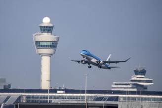 KLM Embraer ERJ-175, aircraft taking off from Kaagbaan runway, 06/24, at Amsterdam Schiphol