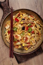 Fried noodles with chicken meat and vegetables, Bami Goreng, Indonesian dish, no people