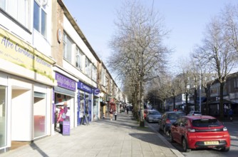 Shops and shoppers shopping street, Cornwall Street, city centre of Plymouth, Devon, England, UK