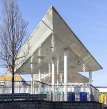 Triangular white canopy and slender columns, Plymouth bus station, Plymouth, Devon, England, UK