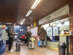 Passengers queuing at The Westcountry Larder Coffee takeaway shop shop, Tiverton Parkway railway
