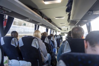 Passengers sitting onboard rail replacement bus coach, Plymouth, Devon, England, UK