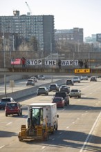 Detroit, Michigan USA - 2 March 2026 - Signs are posted on a pedestrian crosswalk over a freeway