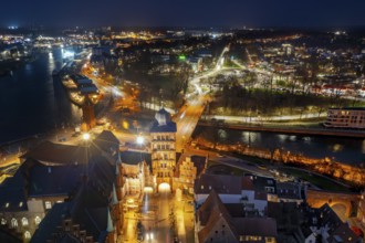 Aerial view over the Gothic Burgtor, medieval northern town gate of Hanseatic city Lübeck,