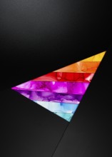 A bold triangular design featuring vibrant colors inks like orange, red, purple, and blue against a