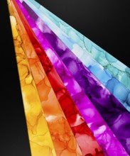 Diagonal lines of colors inks with a liquid texture in paper create a striking contrast against a