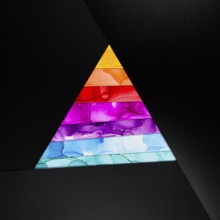 A vibrant geometric triangle featuring layers of vivid colors inks against a dark backdrop. The