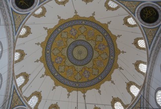 Elaborate patterns on the dome ceiling of a mosque viewed from inside, Selimiye Mosque, Konya