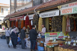 Bustling market with hanging spices and people shopping, Konya, Central Anatolia, Turkey