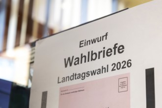 Absentee voting symbol: Sign on a municipal administration for dropping in ballot letters