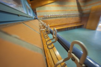 Close-up view of hooks and blue tiles in a functional room, Schlehengäu Grund Schule Gechingen,