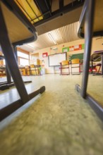 Floor view of an empty classroom, chairs in the foreground, Schlehengäu Grund Schule Gechingen,
