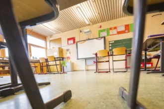 An empty classroom with chairs and blackboard, inviting environment for learning, Schlehengäu Grund