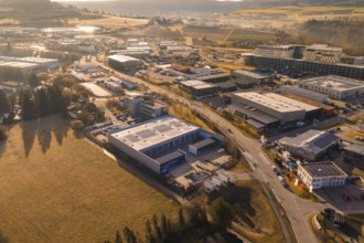 Panoramic aerial view of an industrial complex surrounded by fields and roads, Calw, Calw district,
