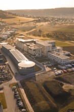 Industrial complex with modern buildings in a rural area with fields, new hospital at the Calw