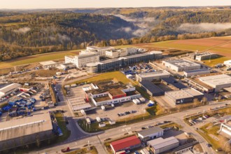 Industrial area surrounded by forest and hills with urban features, new hospital at Calw Health
