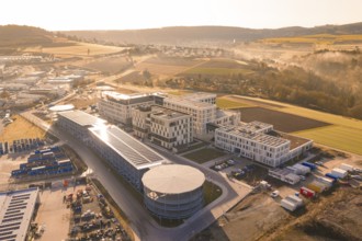 Aerial view of a large industrial area in a hilly landscape, new hospital at the Calw health