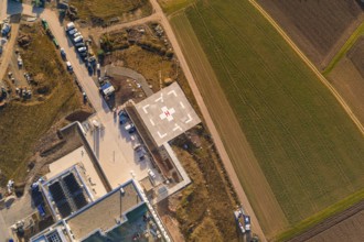 Aerial view of the helicopter landing pad in a rural region with infrastructure, new hospital at