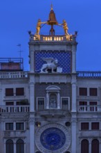 Two bronze figures ring the bell on the clock tower, dawn, Venice, Veneto, Italy