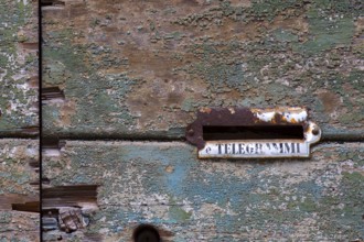 Letter box for telegrams on an old door, Venice, Veneto, Italy