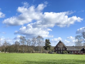 White torn tattered frayed ragged cumulus fractus cluster clouds, Germany
