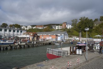 Fishing boats and fish shops at the city harbor, Sassnitz, Rügen, island, Baltic Sea,