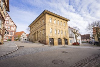 Historic sandstone building on a paved street in a quiet town, Ötisheim, Enzkreis, Germany