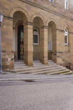 Building with stone arches and steps, typical entrance of a historic structure, Ötisheim, Enzkreis,