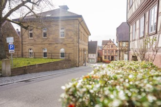 Street scene in a historic district with old buildings and intersecting roads, Ötisheim, Enzkreis,