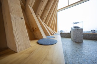 Modern interior with wooden seating facing a large window, Sinnraum, Oberreute, Allgäu, Bavaria,