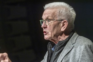 Portrait of Winfried Kretschmann giving a speech. Political Ash Wednesday of the Green Party in