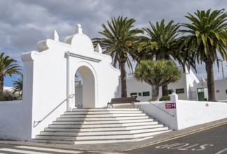 White staircase in a square with palm trees, Teguise, Lanzarote, Canary Islands, Spain