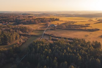 Open landscape with fields and forests at sunset, isolated houses bring seclusion, Gechingen, Calw